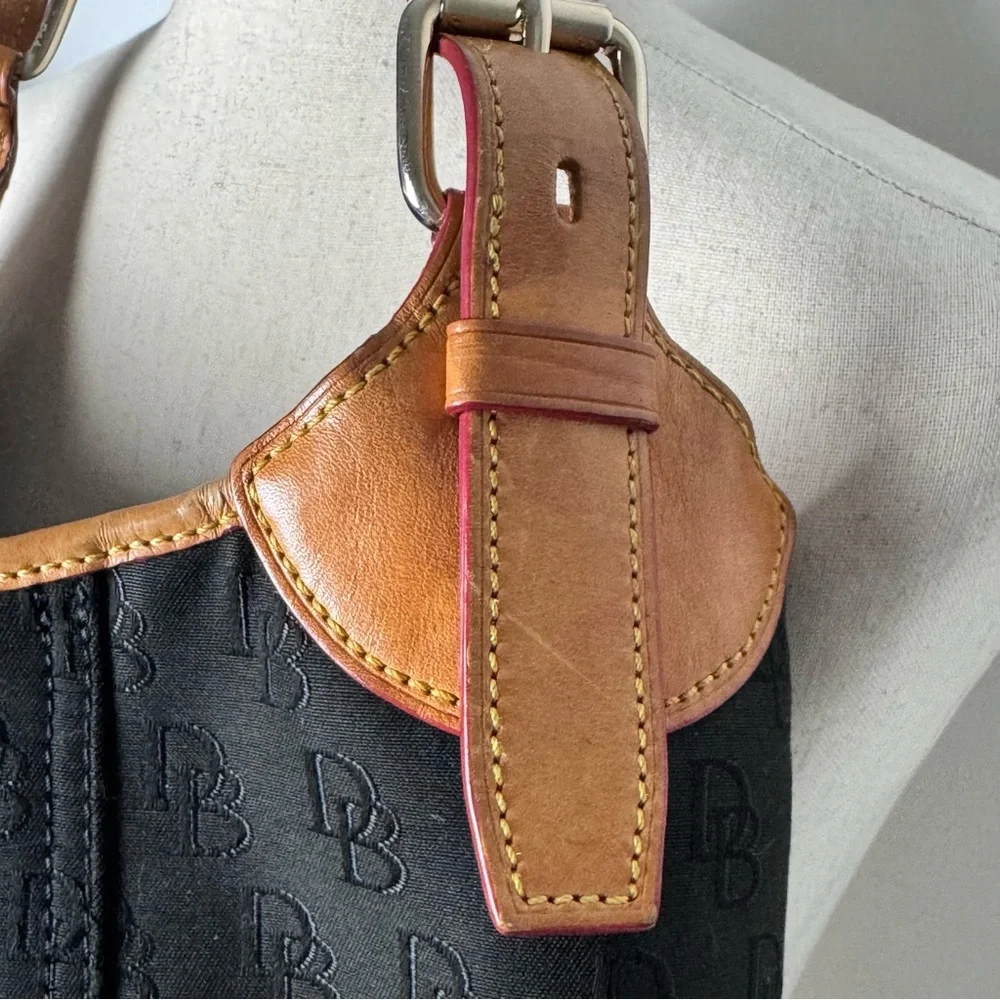 Dooney & Bourke black and tan‎ monogram Handbag hobo